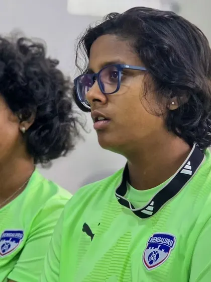 Two players from our girls' team listen intently during the BrainEye seminar. We empower our players with knowledge to take control of their health and performance.