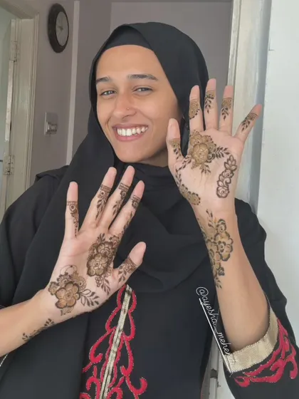 Another shot of my wonderful client, radiating joy with her fresh henna. Creating these light, beautiful designs is always a pleasure.