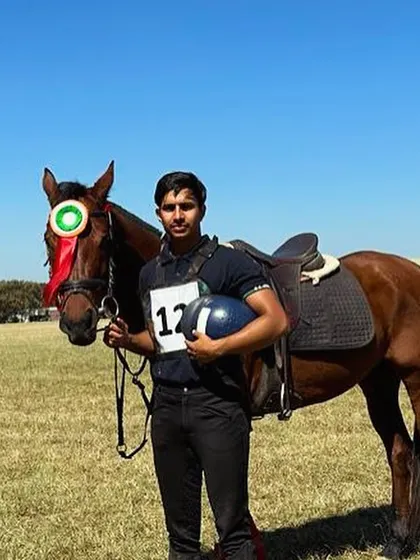 One of our young riders with his horse after a win at the Junior National Equestrian Championship. The bond between horse and rider is the foundation of every victory.