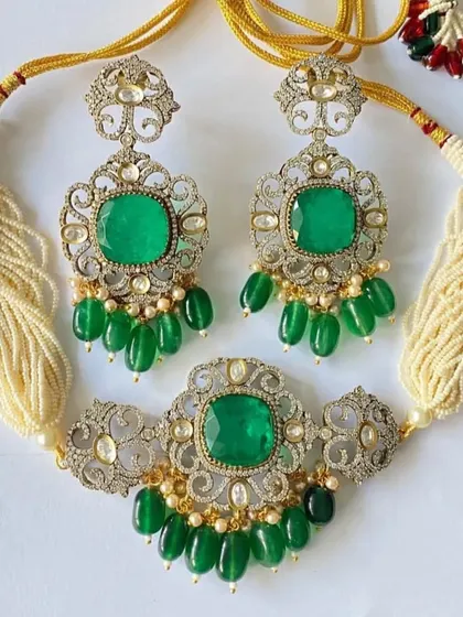 Another view of the royal green choker set, showing the adjustable golden thread and the complete set against a white background. The matching earrings are just as grand as the necklace.