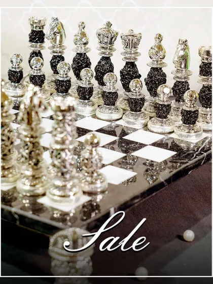 Make your move in style. This luxurious silver and black chess set is more than a game; it is a statement piece of home decor, designed to add an element of intellectual elegance to your living space.