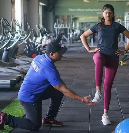 Form comes first, always. Here, I am assessing a client's single-leg balance and stability. This simple test tells me a lot about core strength, coordination, and potential muscle imbalances. By identifying these details, I can create a program that prevents injury and builds a truly strong foundation.