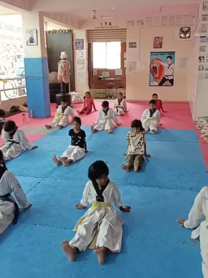 The 4 pm batch at our Chellikere dojang during a stretching exercise.