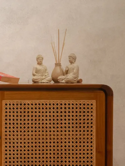 A styled shot of the 'Kayo' cabinet, demonstrating how it serves as a beautiful surface for displaying decor.