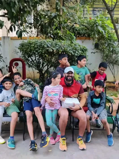 A moment of rest and fun with the BBR kids. After a good training session, it's all about enjoying the camaraderie and celebrating the effort everyone put in.