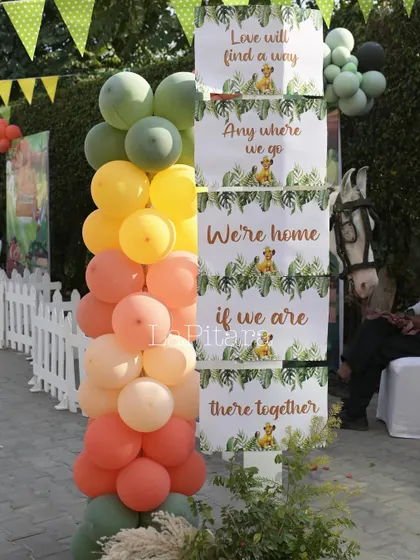 A themed signpost with quotes about togetherness, reinforcing the family-centric message of The Lion King.