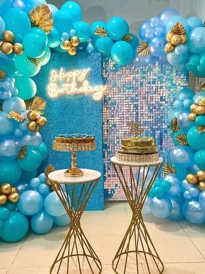 An identical image of the all-blue theme, showcasing the rich colors and textures of the glitter backdrop and balloon arrangement.