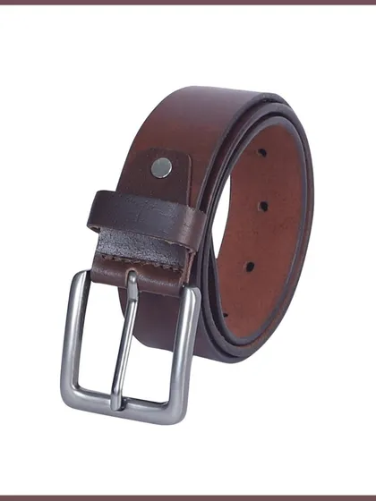 A coiled brown leather belt, shot to highlight its flexibility and the buckle detail.