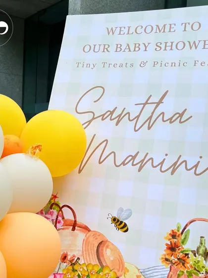 Welcome to the barnyard bash. This cute welcome sign, with its gingham print and picnic basket illustration, set a fun and rustic tone for this farm themed baby shower.