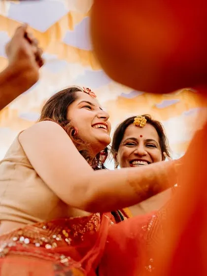 A warm embrace between a bride and her mother during the Haldi ceremony. These are the priceless, emotional moments we ensure are never missed.