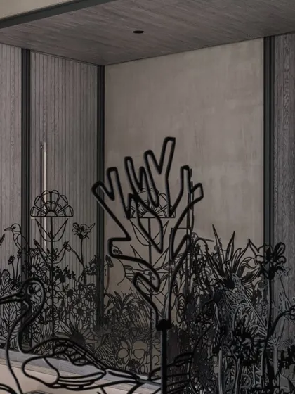 A close-up view of the 'Kalrav Seasons' railing, showing the detailed craftsmanship of the metalwork. Each element, from the swan to the coral-like branches, is carefully designed to contribute to the overall naturalistic narrative.