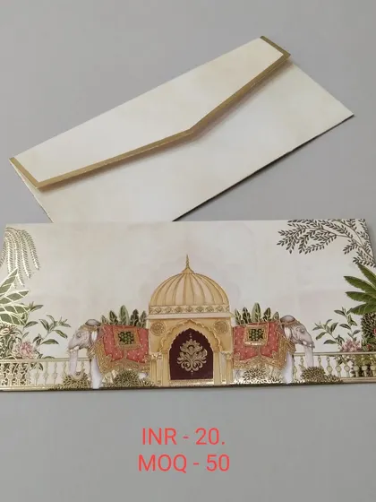 This is one of my classic designs for a wedding shagun envelope. It features a detailed palace entrance with decorated elephants, finished with elegant gold foil on high-quality paper.
