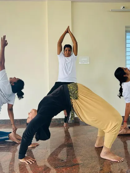 A different angle of our group creating a beautiful, harmonious shape with their bodies. This is the result of dedication, practice, and a supportive community.