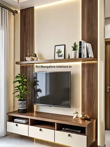 A compact and efficient TV unit design perfect for smaller living rooms or bedrooms. We used a mix of wood and white laminate, with integrated backlighting and a floating shelf to make the space feel larger.