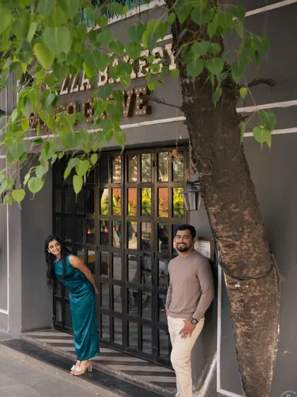 Framed by the leaves of a Peepal tree, this shot feels like a secret moment we stumbled upon. It’s a playful and sweet capture from their city pre-wedding session.