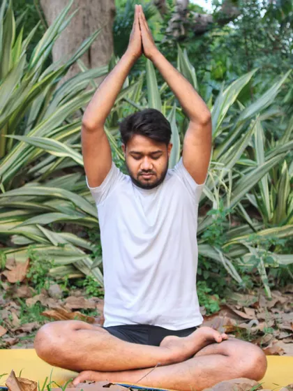 The ultimate goal of yoga is to find a state of inner calm and balance. Here, in a simple seated meditation pose, I connect with my breath and the stillness within, a practice we conclude every session with to integrate the benefits of our work.