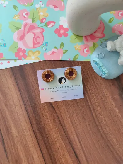 My zardozi studs are perfect for everyday wear or for the office. They feature intricate thread work and are available in a wide range of colors to match any outfit.