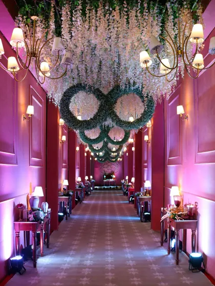 Your wedding is a journey, and we design every step of it. This grand, illuminated walkway for our 'Anant' themed wedding created a dramatic and enchanting entrance, building anticipation for the ceremony ahead.