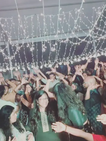 A candid moment of joy on the dance floor. These are the moments that make wedding gigs so special.