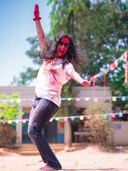 Another shot of pure, uninhibited dancing at an outdoor Holi party. I can adapt my sessions to any venue, whether it's a studio, a lawn, or a community ground.