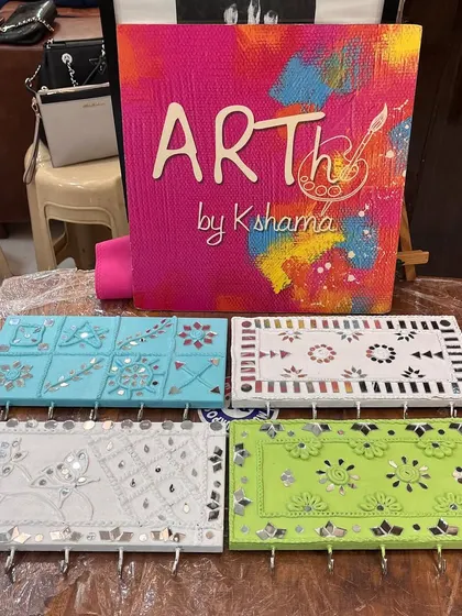 These are the custom Lippan art key holders I designed for a 60th birthday paint party. I created four different designs for the guests to choose from and personalize.