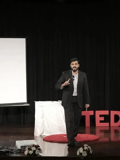 On the TEDx SBSC stage, ready to share my passion for mentalism with the audience.