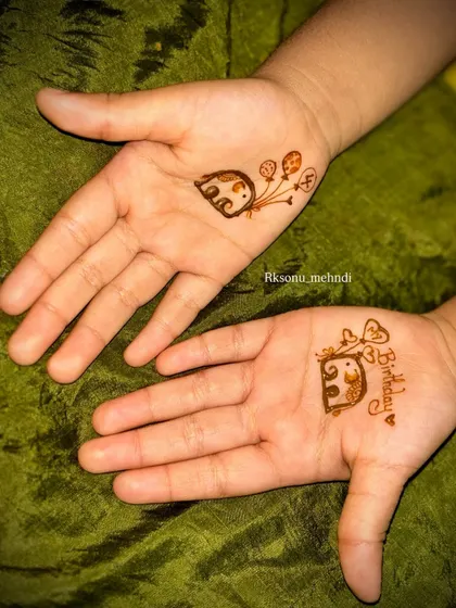 Even the little ones can enjoy mehndi! This adorable and minimal elephant design is perfect for a child's birthday party, offering a touch of fun without being overwhelming.