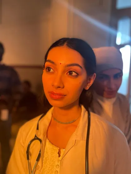 A still from the bilingual film 'Dange/Por' where I played Bhama, a character who transitions from a doctor to a dancer. This role challenged me to portray two very different worlds and mindsets within a single narrative.