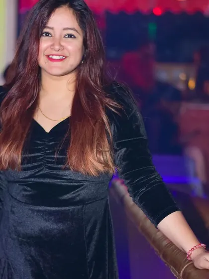 A stylish guest enjoying the Saturday night vibe. I make sure the atmosphere is perfect for everyone to have a great time.