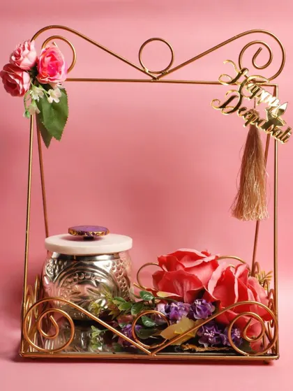 A beautifully styled festive gift item in a golden wire frame, perfect for a Diwali or wedding gift catalog.
