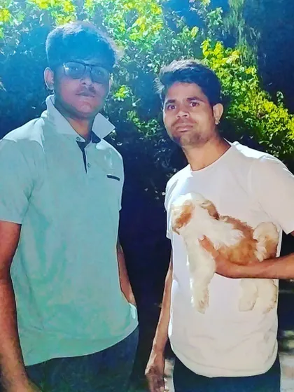 This client was thrilled to take home his new male Shih Tzu puppy. I make sure every handover is a positive experience, and the client's happiness is my key to success.
