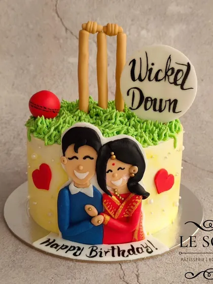 A fun combination of cricket and romance for a birthday. This half-kg Chocolate Truffle cake features a couple figurine alongside cricket stumps and a ball.