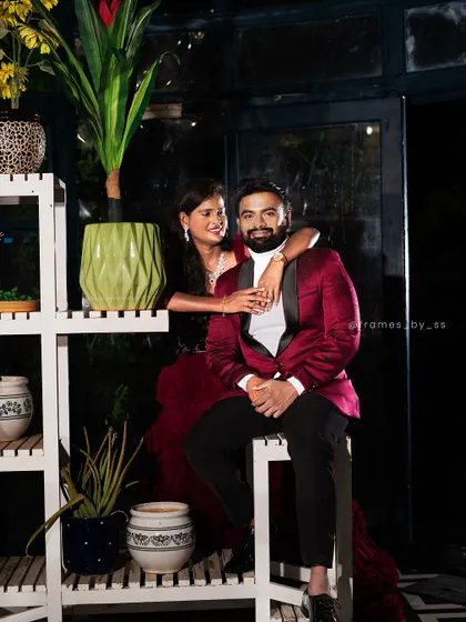 The perfect couple shot, with him looking sharp in our pre-loved maroon tuxedo. It’s about coordinating in style, not just in color.