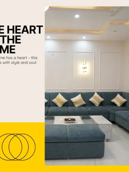 The heart of the home beats with style and soul. This L-shaped blue sofa in a client's living room provides ample seating and a pop of color, creating a warm and inviting central space.