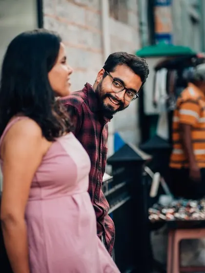 A pre-wedding shoot doesn't always need a grand location. This candid moment was captured on a busy Bangalore street, proving that love stories can be found and beautifully photographed anywhere.