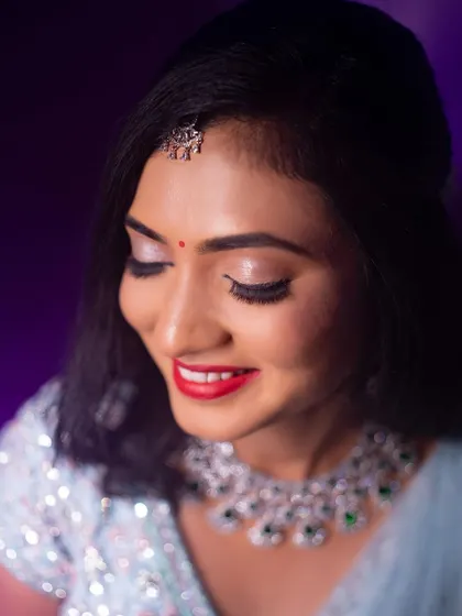 A duplicate of the close-up on Rakshita's beautiful reception makeup.