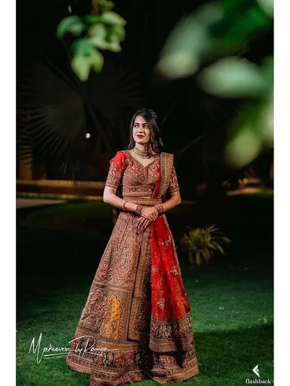 Another stunning portrait of the bride in her gorgeous lehenga.