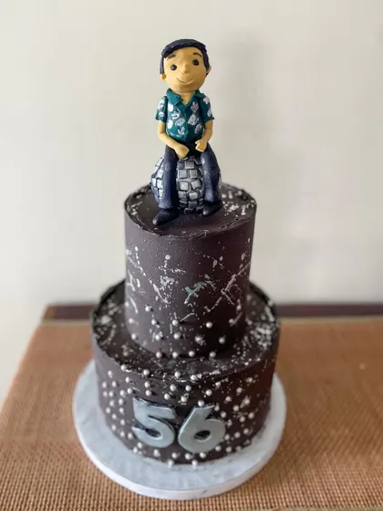 The fondant figurine was customized to look like the birthday person.