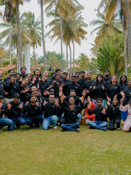 It's not just about weddings. I also capture the energy of corporate events, like this fun team outing in Bangalore. Getting a great group shot with everyone celebrating is always a highlight.