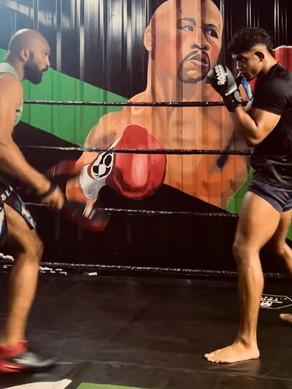 Close-up of a pad work session. This is where we refine technique and build muscle memory for boxing.