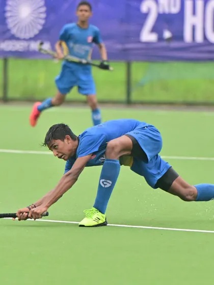 An action shot showing the intensity and athleticism required in modern hockey.