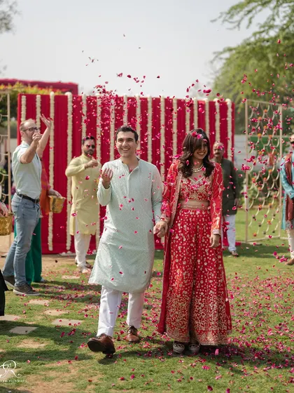 Another angle of their joyful entrance, capturing the excitement of the moment.