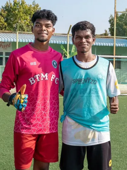 Our "inseparable duo," Spiderman and Mugi, posing for a photo on the training ground.