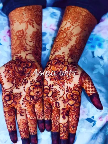 The rich, reddish-brown stain of this floral design shows the quality of my organic henna. The color is deep and even across the palms and fingers, which is exactly what you want for your bridal mehendi.
