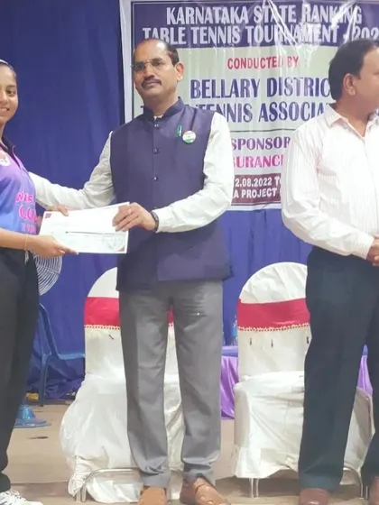 Sahana H Murthy being awarded for her performance as the Women's runner-up at the Bellary State Ranking Tournament.
