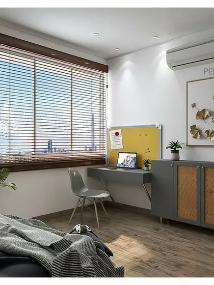 A view of the study and storage console in the rattan-themed bedroom, showing how the material can be used on furniture to create a cohesive look.