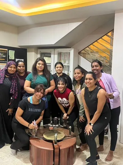 The heart and soul of my classes. Each photo captures a unique moment with my incredible community after a sweaty, joyful session. This is our shared victory lap.