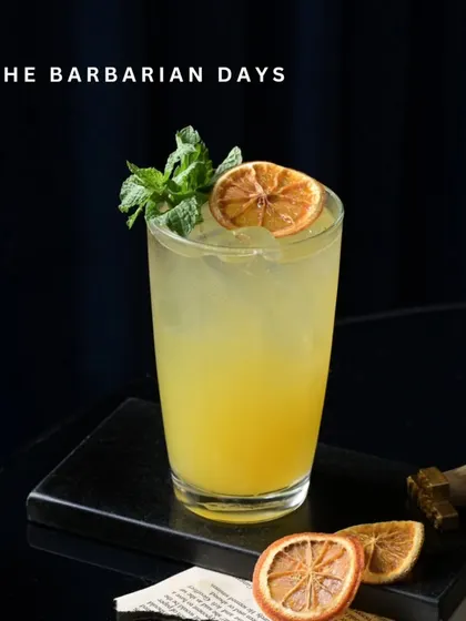 The Barbarian Days is a zesty mix of orange juice, passionfruit, and mint. It's a bold, refreshing flavor for when you're feeling adventurous.