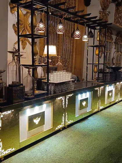 Another perspective of our long, illuminated buffet counter. The design ensures that even in a large hall, the food service area is a distinct and attractive feature of the event.