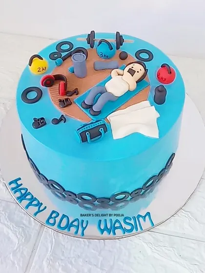 The full view of the fitness-themed cake. It's a fun and personalized way to celebrate someone's passion for health and exercise.